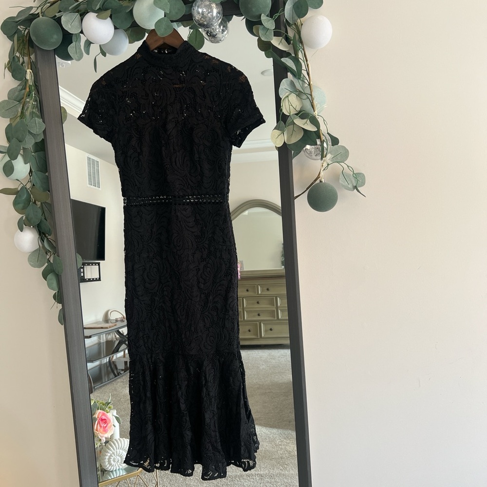 Black lace midi dress with ruffle hem and short sleeves #gothicchic #partydress